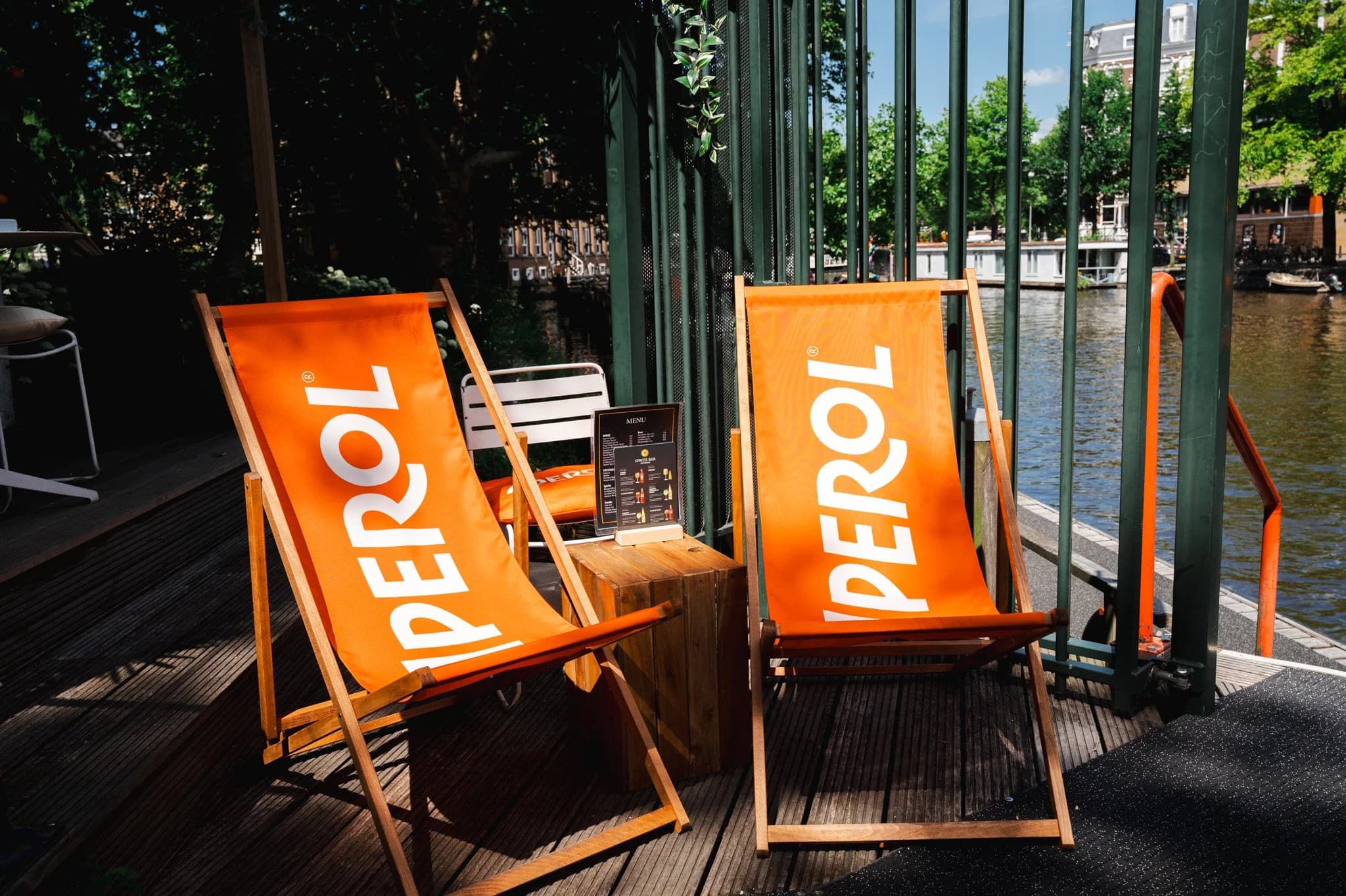 Spritz Bar Amsterdam canal terrace at golden hour near Leidseplein